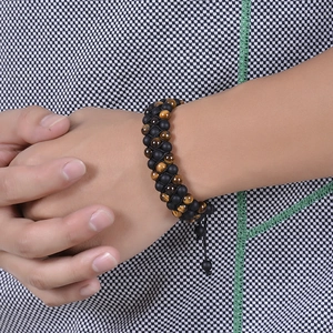 Adjustable double-row tiger eye and matte onyx beaded braided bracelet for men and women