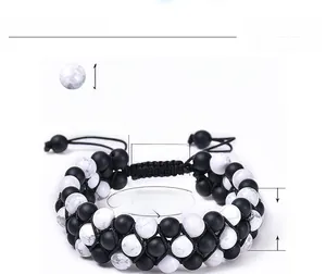 Detailed view of 3-layer braided white howlite and matte black bead bracelet with adjustable knot