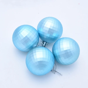 Detail of light blue faceted disco-style Christmas balls with silver caps and strings