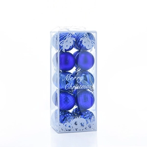 Close-up of 20-piece blue Christmas ball set with assorted textures in transparent box