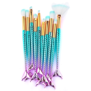 11-piece mermaid makeup brush set with gradient fish tail handles and soft fiber bristles