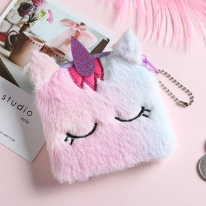 Close-up of plush unicorn coin purse featuring soft gradient fur and metal chain