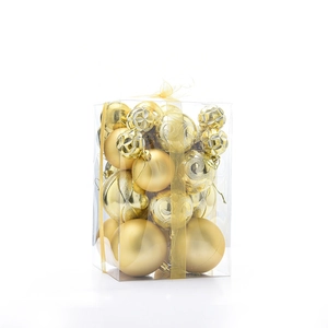 Detail of 30pcs gold Christmas ball set with matte and glitter finishes in clear gift box