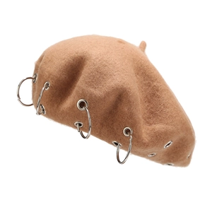 Camel wool beret hat featuring stylish silver metal ring accents and retro British flair