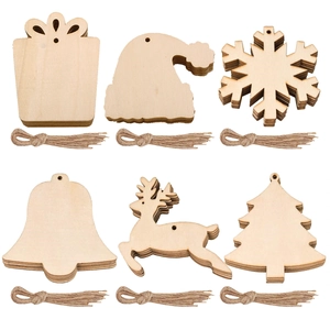 Flat lay of assorted natural boxwood holiday pendants with rustic hemp ropes for decor