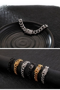 Macro detail of 11mm Cuban link bracelets with pave-set zircons in silver gold and black