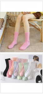 Detail showing ten colorful cotton mid-calf socks for women in soft pastel tones