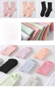 Detail view of colorful cotton socks showing fine knit texture and vibrant candy colors