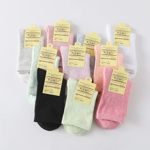 Set of 10 colorful cotton blend ankle socks for women in various pastel macaron shades
