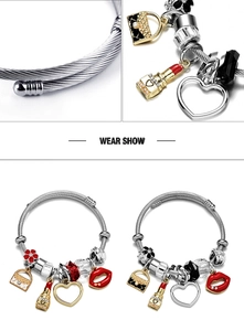 Detailed close-up of beaded steel wire bracelet with red lips and lipstick charms