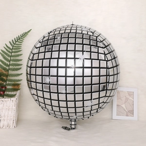 Silver disco mirror balloon with grid design on white faux fur and decor