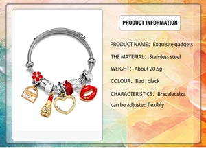 Detail of adjustable stainless steel bangle with red flower and perfume bottle charms