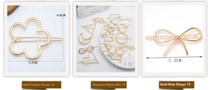 Detailed size chart of gold bow and heart-shaped metal hair clips with dimensions