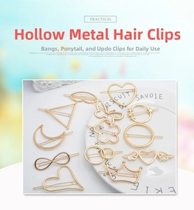 Detailed view of hollow gold metal hair clips in heart, butterfly, and star shapes