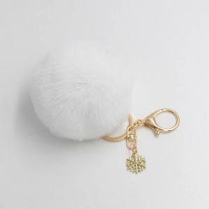 Weißer Kunstfell-Bommel-Schlüsselanhänger mit goldenem Schneeflocken-Anhänger für Taschen