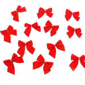 Pack of red flocked velvet Christmas bows with gold ties for holiday tree decorations