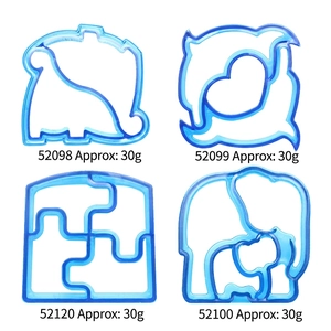 Blue plastic DIY sandwich crust cutter set featuring elephant and puzzle shapes for kids