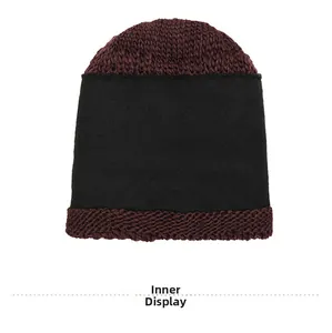 Close-up of winter knit hat showing thick burgundy yarn and warm black fleece lining detail