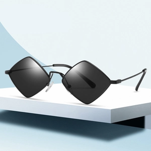 Retro rhombus shaped black metal sunglasses with geometric lenses on a stylish stand
