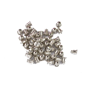Macro shot of silver metal bullet-shaped ear earring back stoppers on a white background