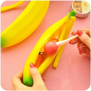 Cute banana shaped silicone coin purse with zipper closure and bright yellow gradient