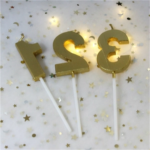 Golden number candles 1, 2, 3 for birthday cake decoration with plastic holders