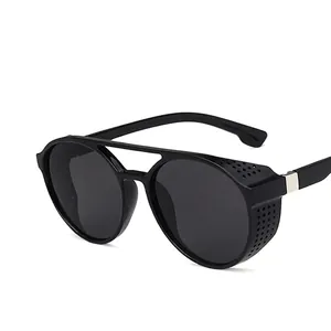 Black steampunk sunglasses with double bridge and perforated side shields on white background
