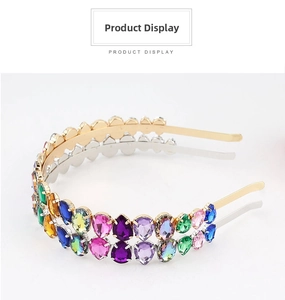Detailed view of the double-row pear-cut multi-colored crystal rhinestones on a gold headband
