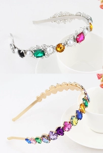 Detail of vintage metal headbands with colorful rhinestones, pearls, and floral alloy patterns