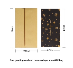 Detail of black gold foil Christmas card with envelope and Merry Christmas text