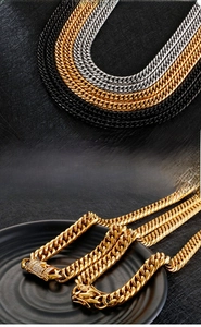 Detailed close-up of Cuban link necklace featuring a luxury micro-pave diamond clasp