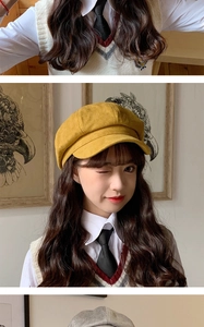 Detail of yellow newsboy cap in faux suede worn with British college style outfit