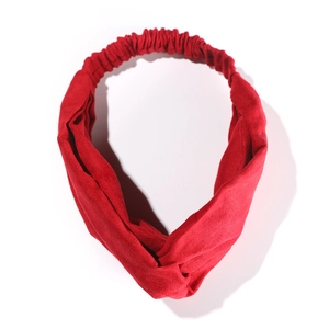 Elastic red velvet headband with a twist knot design for daily wear and face washing