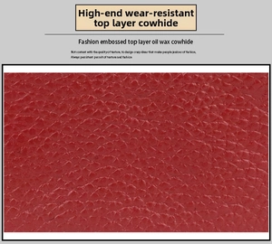 Macro detail of high-quality red oil wax genuine leather with lychee grain texture