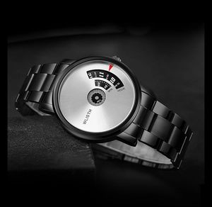Detail of WLISTH watch showing unique rotating disc dial and silver steel case