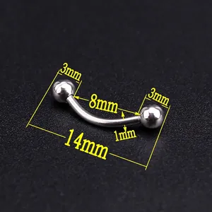 Macro view of 8mm curved stainless steel eyebrow piercing with 3mm metal balls on black background