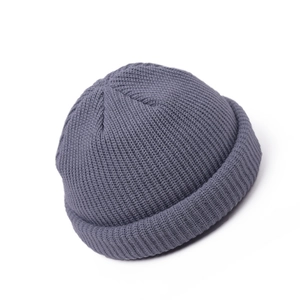 Close-up of dark grey ribbed knit docker cap showing vintage textured stitching details