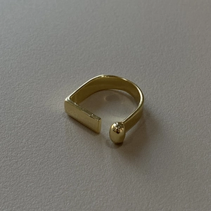 Minimalist gold geometric open ring featuring a square flat head and round ball end