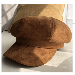 Close-up of dark brown faux suede octagonal hat showing high-quality texture and fabric