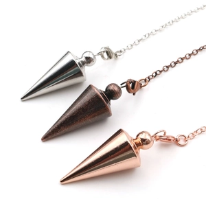 Cone-shaped brass dowsing pendulums in silver, bronze, and rose gold with chains