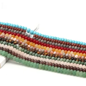 Macro shot of assorted colorful natural stone loose round beads for DIY jewelry making
