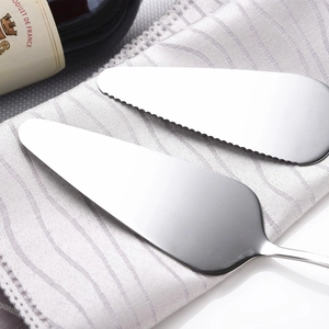 Polished stainless steel cake and pizza server set with smooth and serrated edges