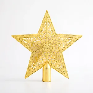 Golden hollow Christmas tree topper star with intricate patterns and secure cone base