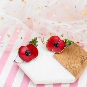 Poppy flower brooches with red enamel and rhinestones on gold and silver metal bases