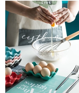 Colorful ceramic egg holder set in kitchen setting for countertop storage and organization