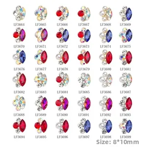 Detailed view of 8x10mm rhinestones and pearls for nail art in various color combinations