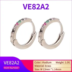 Detailed view of rainbow zircon earrings in gold-plated brass measuring 13mm by 14mm