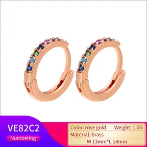 Detail of rose gold brass hoop earrings with multi-color stones, 13x14mm and 1.0g