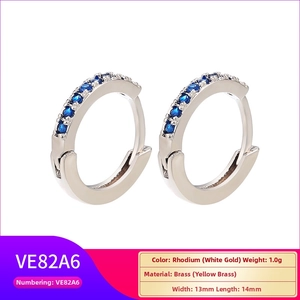 Detail of 13x14mm rhodium-plated brass hoop earrings with blue stones and measurements