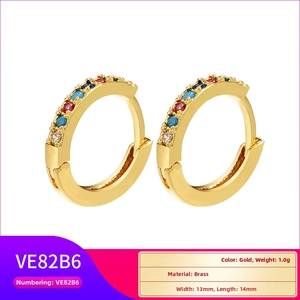 Detail view of colorful zircon hoop earrings in gold brass with 13mm by 14mm dimensions